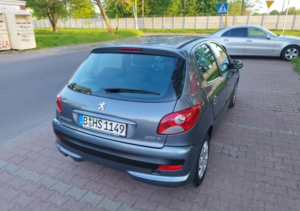 Peugeot 206 plus cena 11900 przebieg: 99875, rok produkcji 2009 z Szczecin małe 352